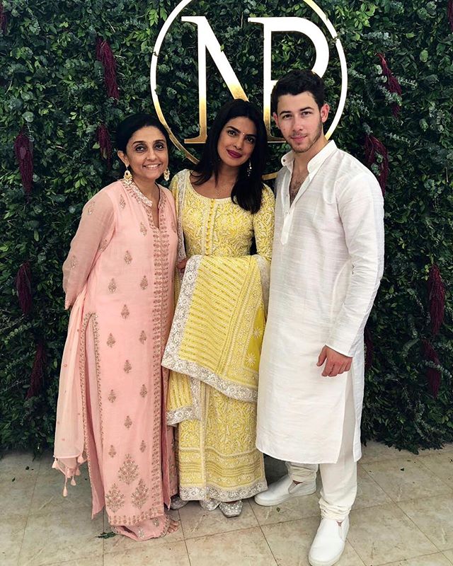 Priyanka Chopra Nick Jonas Posing with Guests