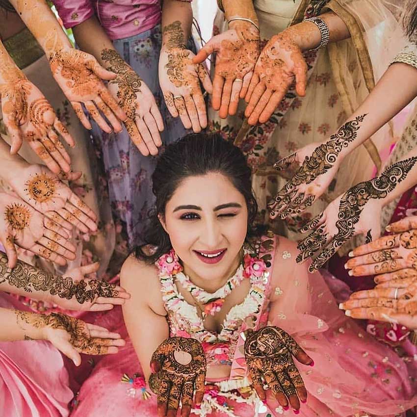 Photo of Bride showing off traditional bridal mehendi | Bridal mehendi  designs wedding, Mehndi designs, Indian wedding photography