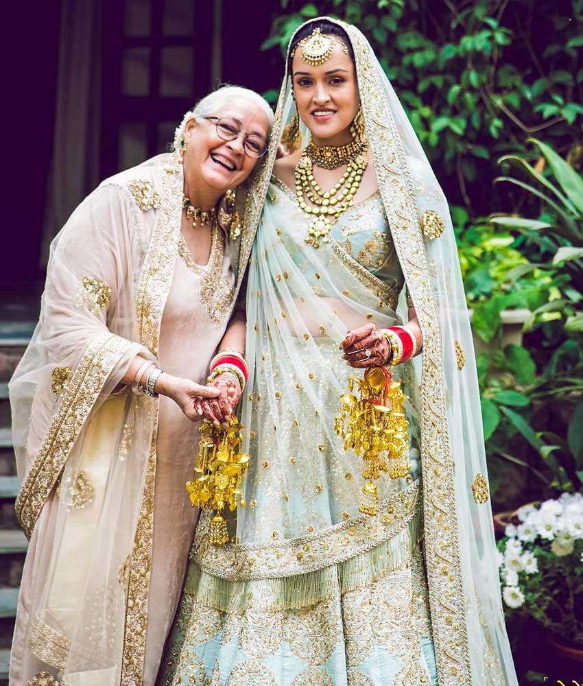 Photo of kiara advani with her mother in an ombre manish malhotra lehenga