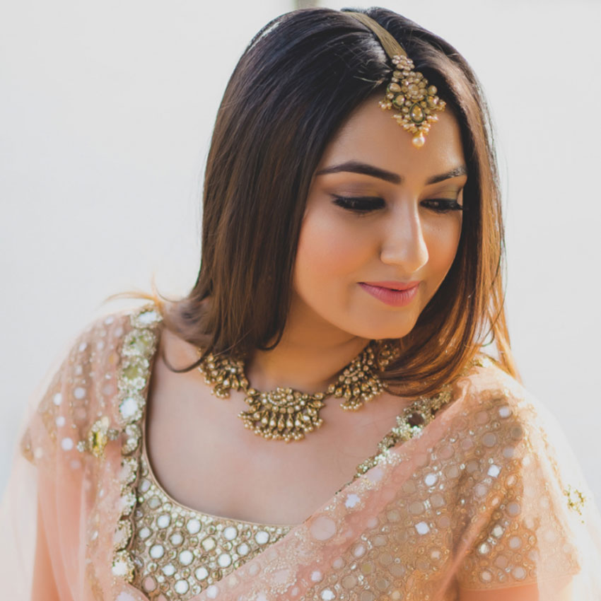 A Maharani-inspired North Indian bridal makeup look for a bride wearing a  red lehenga is a classic and stunning choice. This look is all… | Instagram